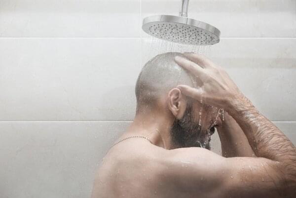 men taking hot water shower