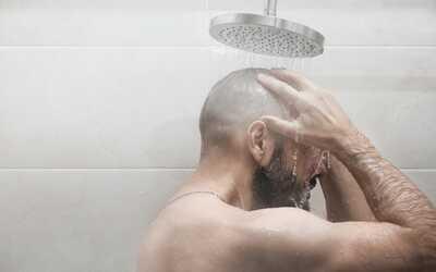 Men taking hot shower