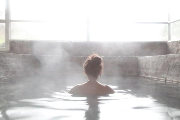 women soaking in hot spa